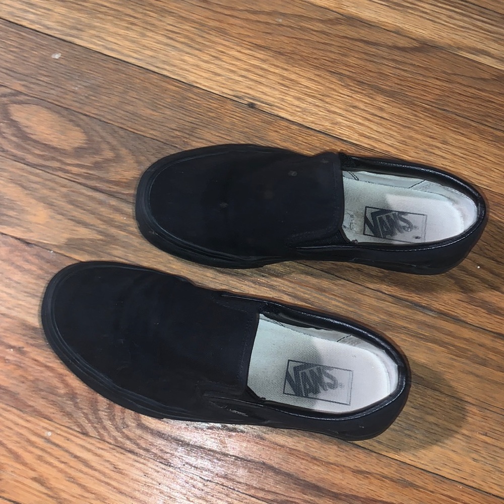 black slip on vans. lightly used. size 8.